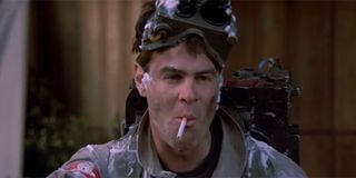 Dan Aykroyd smoking a cigarette after saving New York