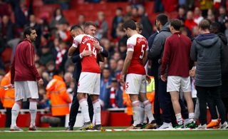 Arsenal’s Aaron Ramsey says goodbye to his team-mates on the pitch