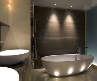 Contemporary open bath tub with ceiling and floor lights