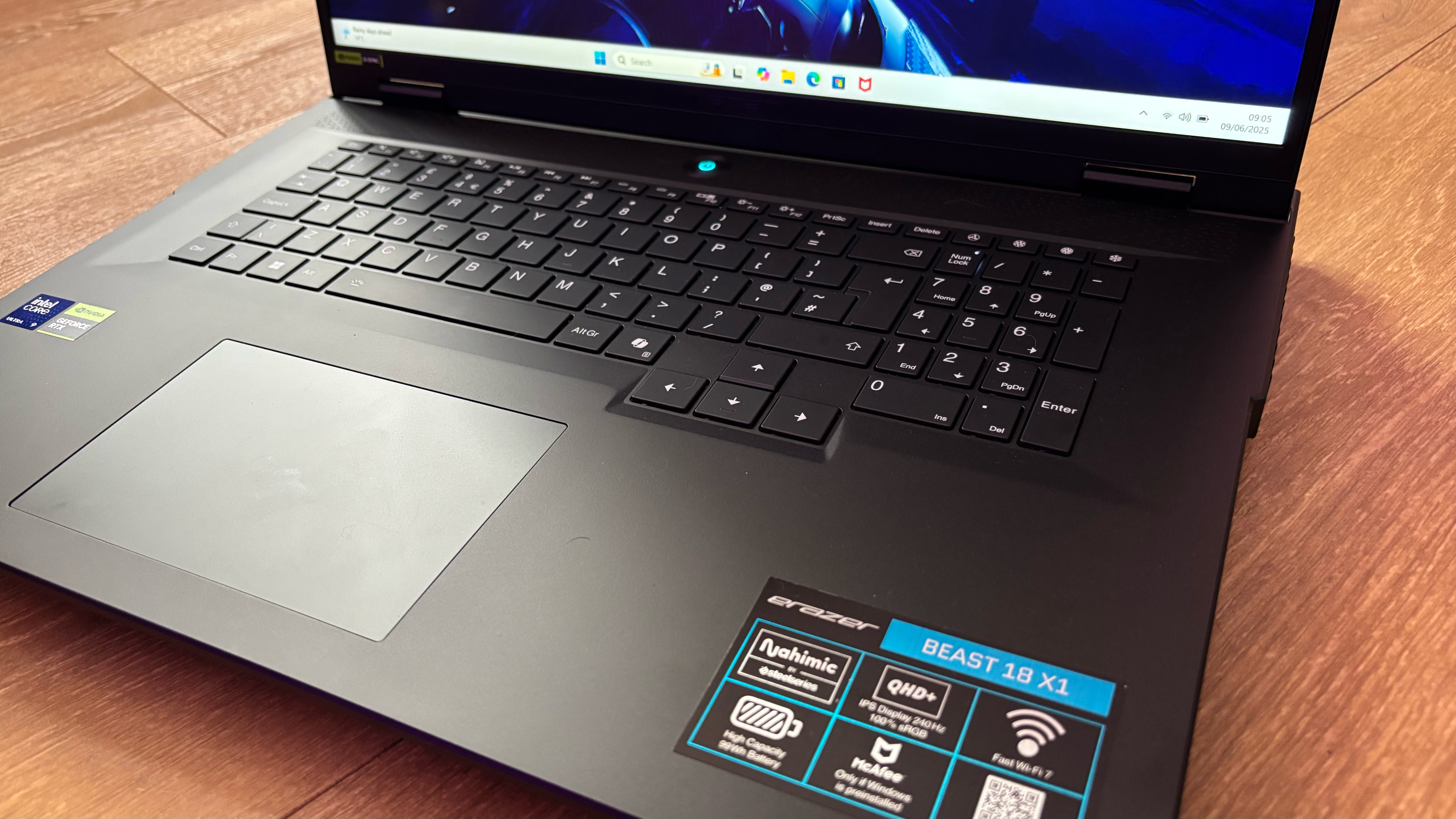 Medion Erazer Beast 18 gaming laptop on wooden floor