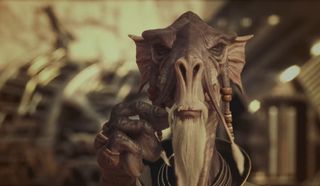 A Star Wars alien strokes his mustache
