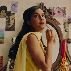 amrit kaur as young miriam looking in the mirror in the movie the queen of my dreams