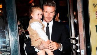 Harper Beckham and David Beckham at NYFW