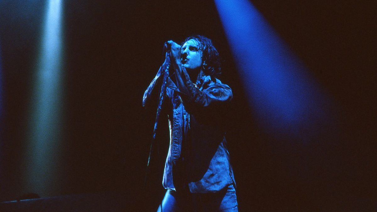 : Trent Reznor of Nine Inch Nails performs at the Glastonbury festival at Worthy Farm on June 23, 2000 in Pilton, United Kingdom