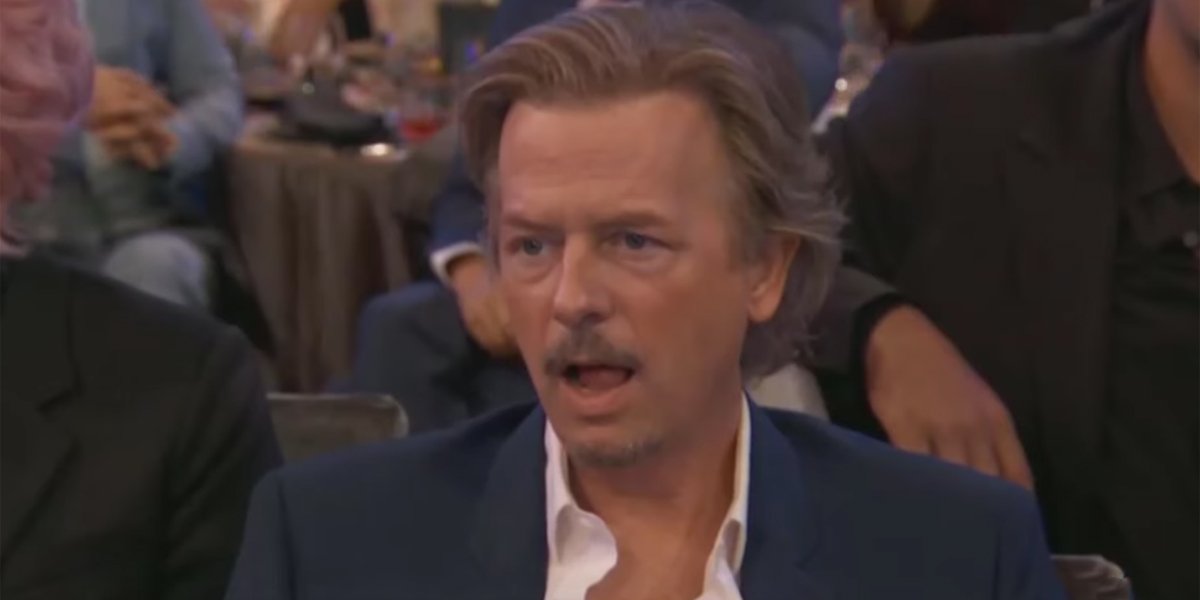 David Spade licking his lips at Noah Centineo 2019