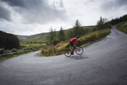 Cyclist riding up devil&#039;s staircase wales