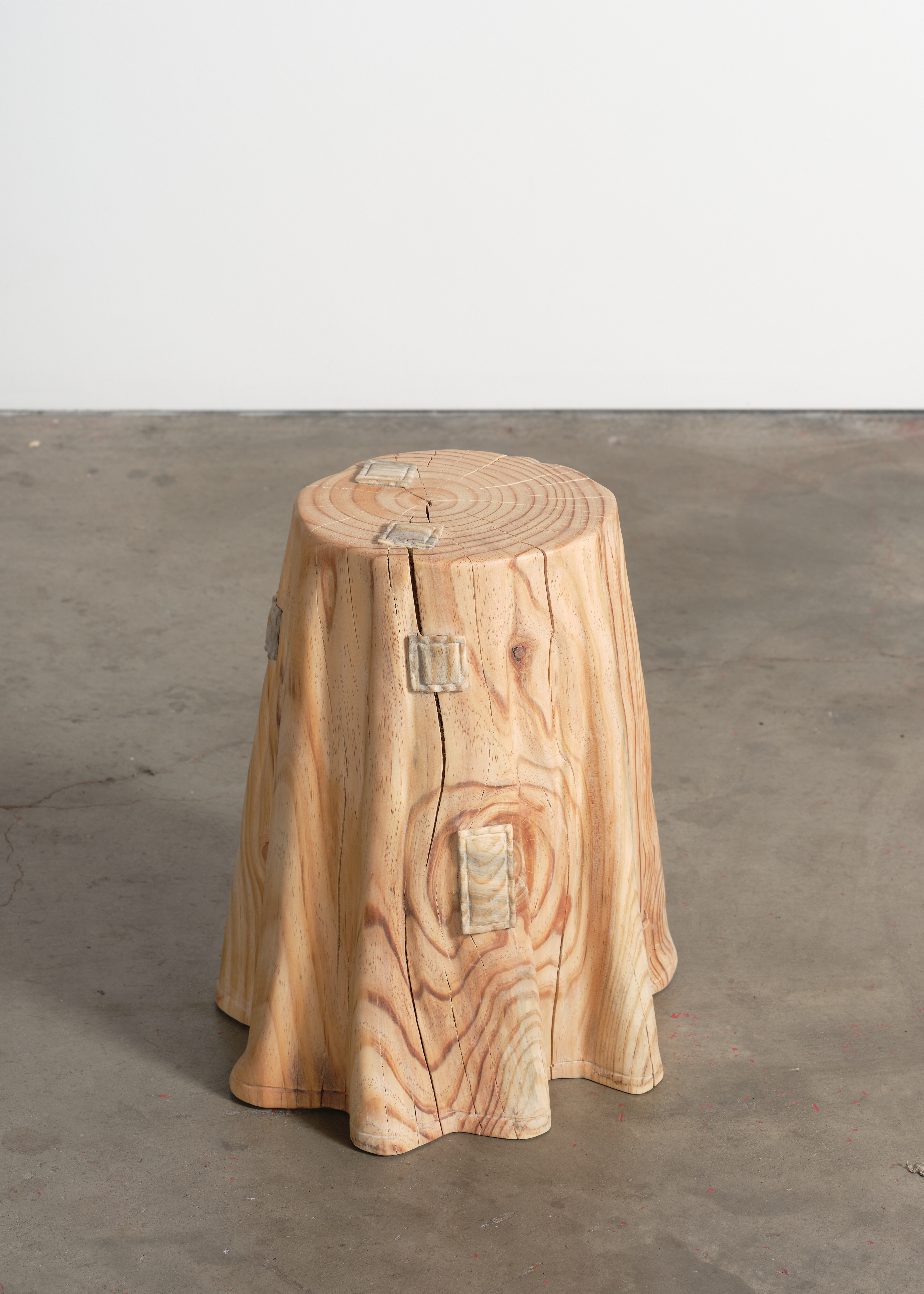Wooden stool made of wildfires wood, by Sam Klemick