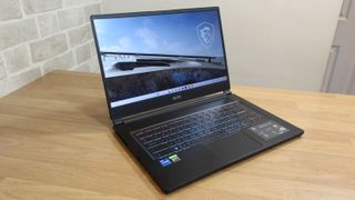 MSI Stealth 15M laptop open angled forwards