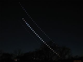 Triple conjunction of the moon, Jupiter and Venus shown in multiple exposures.