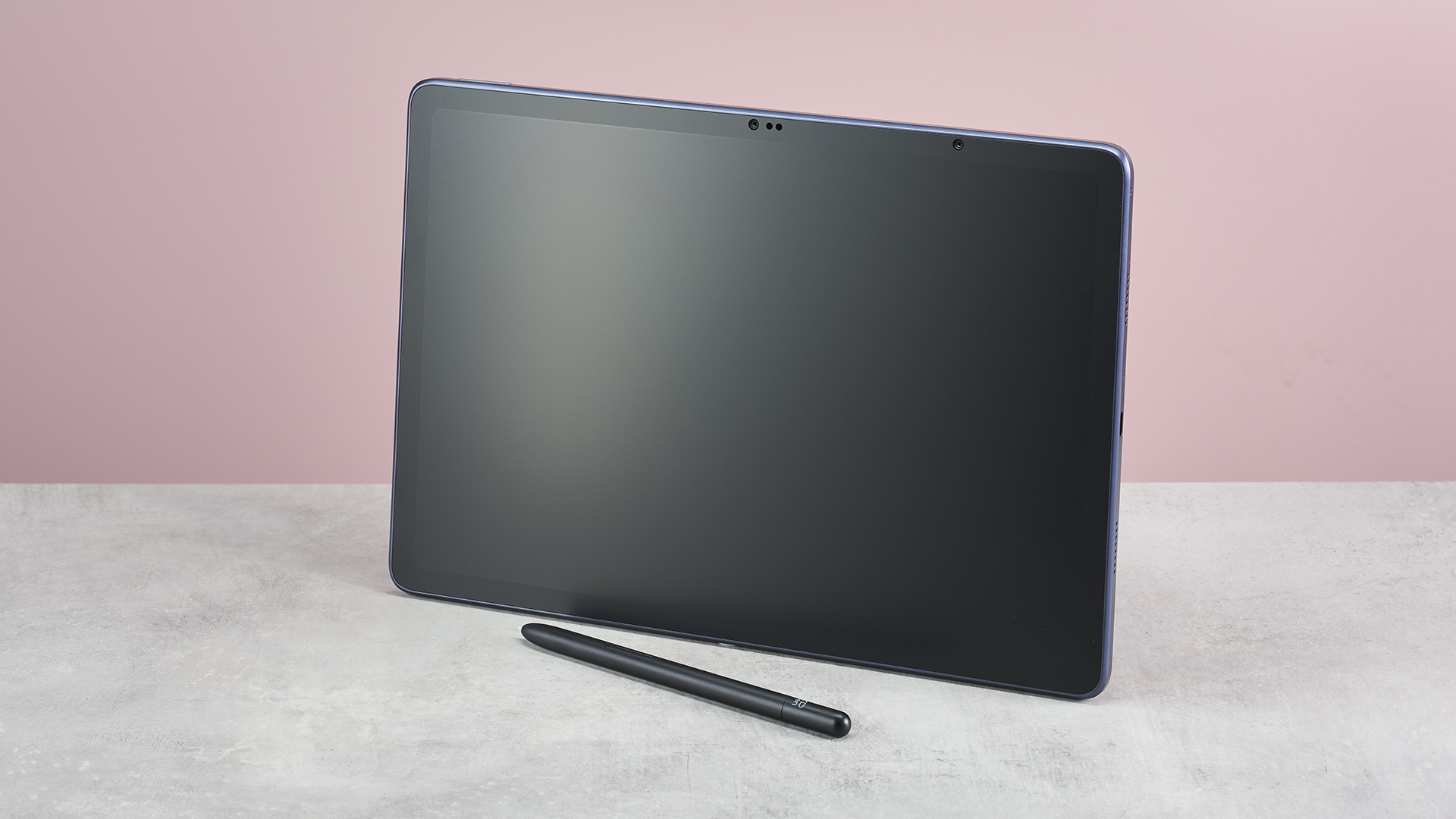 XP-Pen Magic Drawing Pad on standby, balanced on its edge with stylus placed in front of it