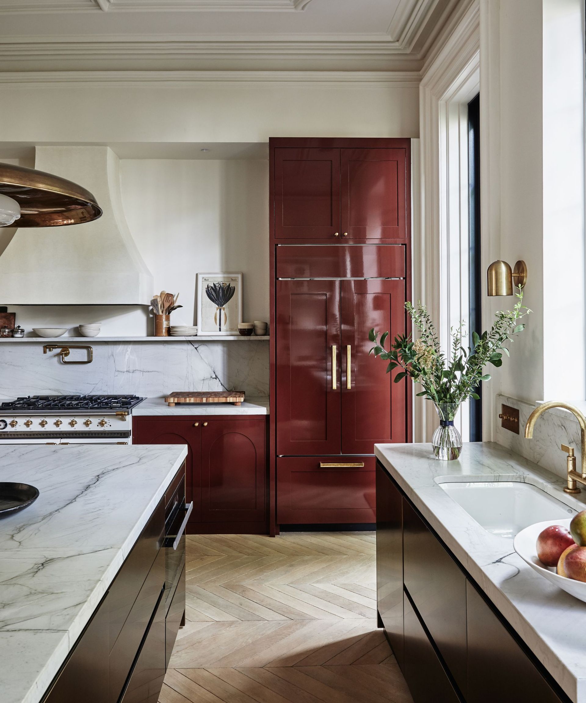 red gloss kitchen with shaker cabinets and a black gloss island