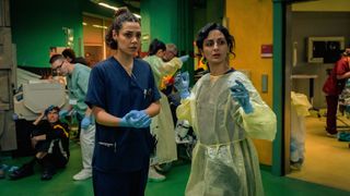 Two doctors standing in a hospital hallway in Berlin ER