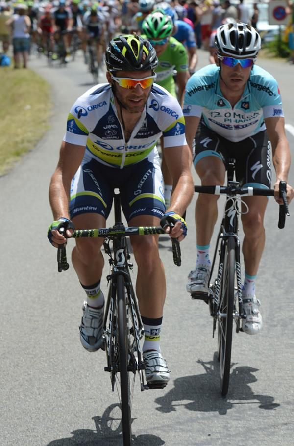 Michael Albasini (GreenEdge) kicks off the aggressions