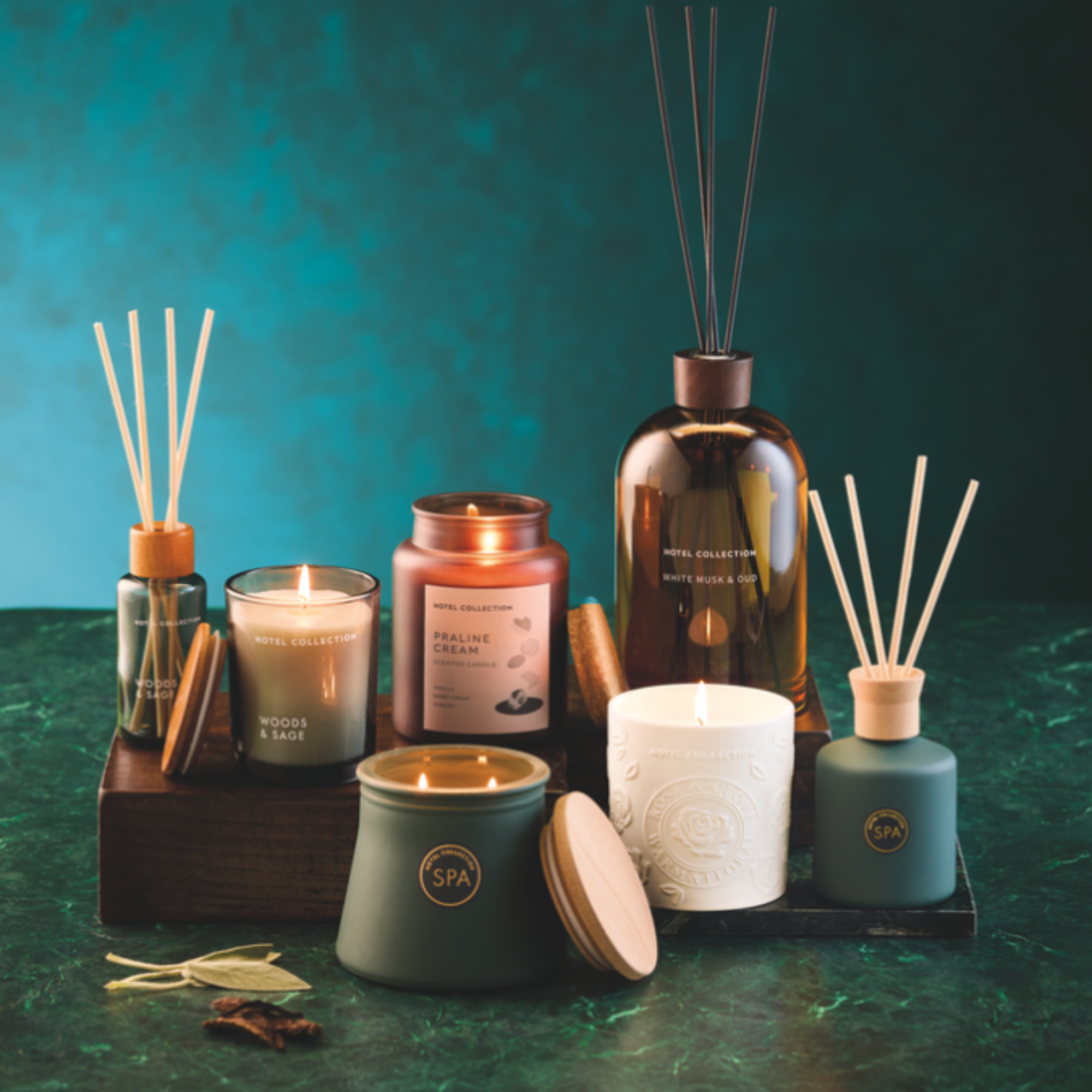 Aldi new candles in a group shop on a jade background