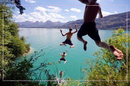 teenagers jumping off a cliff