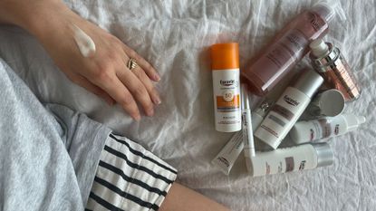 Eucerin Anti-Pigment skincare swatched on a hand