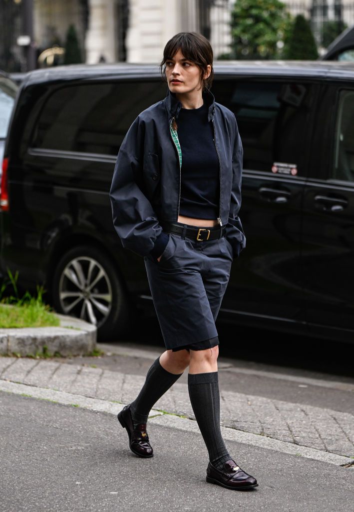 Emma Mackey wearing Miu Miu loafers
