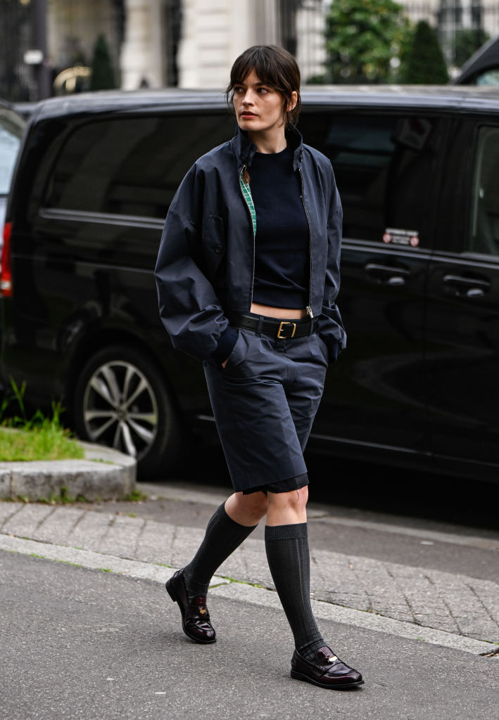 Emma Mackey wearing Miu Miu loafers