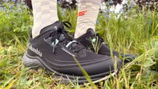 Grace Walsh wearing the Columbia Konos Speed Trail Shoes on grass