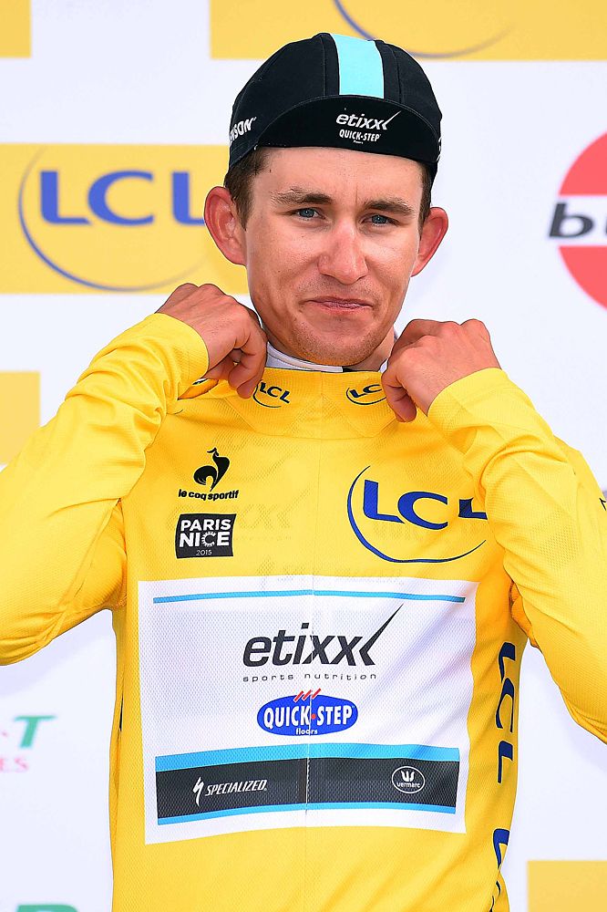 Michal Kwiatkowski (Etixx-QuickStep) tries on another yellow jersey
