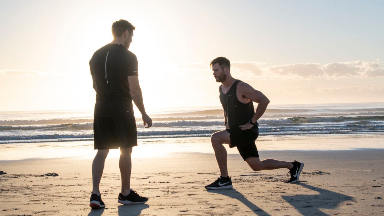 Luke Zocchi taking Chris Hemsworth through a workout