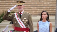 Queen Letizia joined King Felipe for the patriotic ceremony in which their daughter, Leonor, saluted the flag