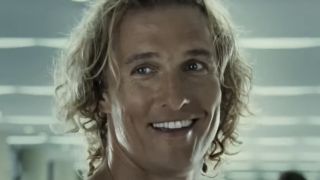 Matthew McConaughey smiling at airport security in Surfer, Dude