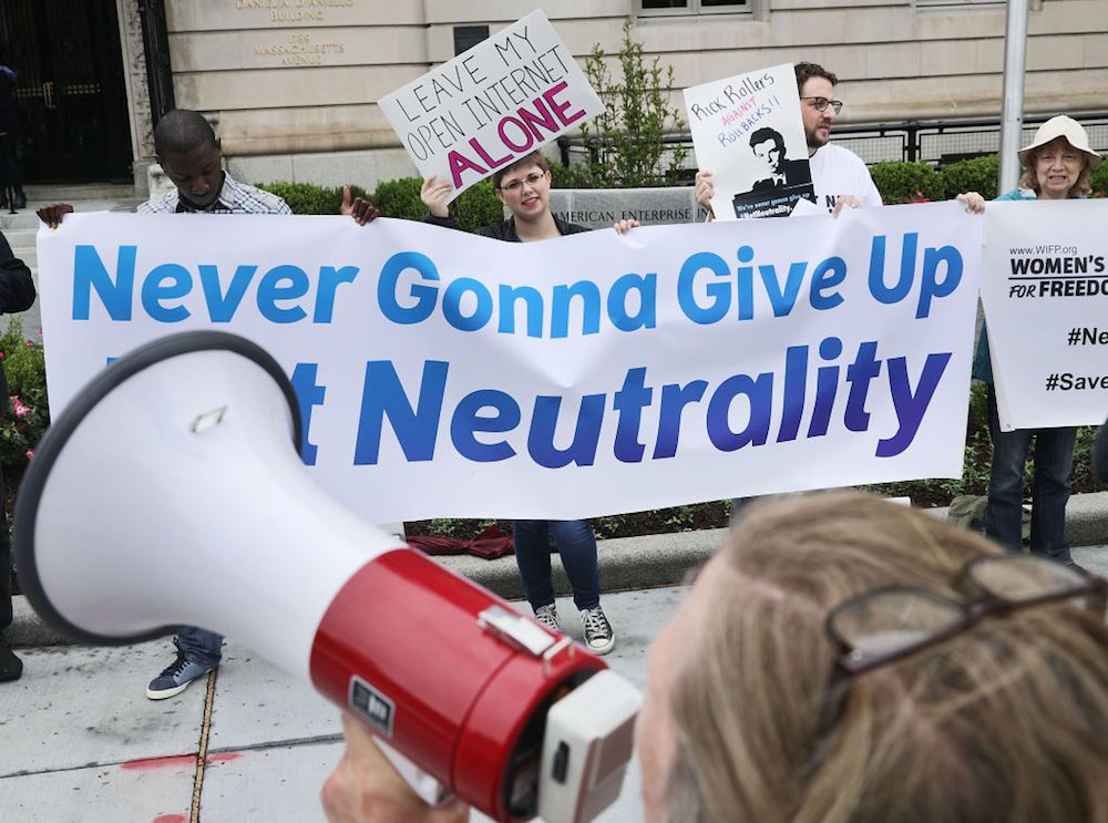 Proponents of net neutrality protest against Federal Communication Commission Chairman Ajit Pai outside the American Enterprise Institute before his arrival on May 5, 2017, in Washington, D.C.