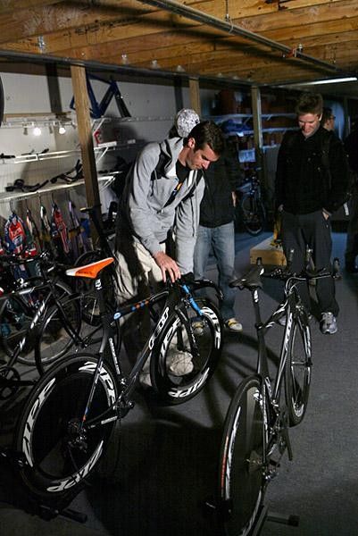Just a little tweak from David Millar as new teammate Dave Zabriskie looks on.