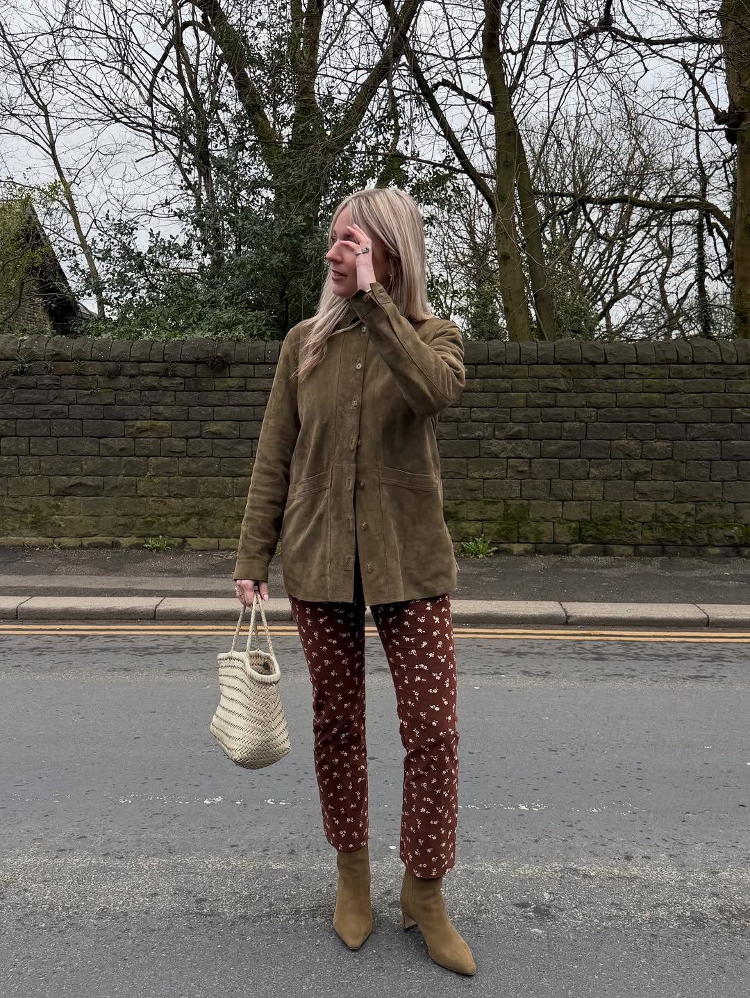 woman wearing suede button down jacket trend 2026