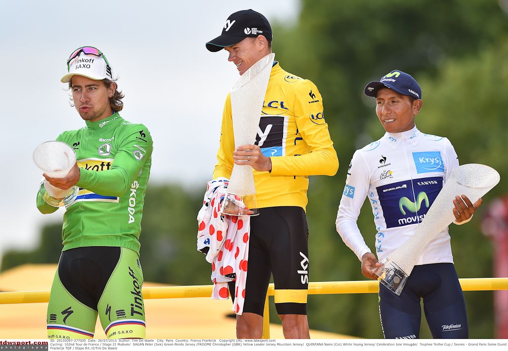 Peter Sagan clowns around on the podium while Chris Froome and Nairo Quintana look on.