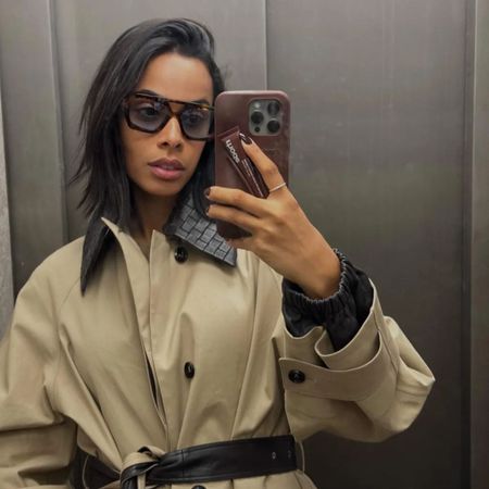 Rochelle Humes taking a mirror selfie with a Rhode phone case showing off her stylish bob haircut