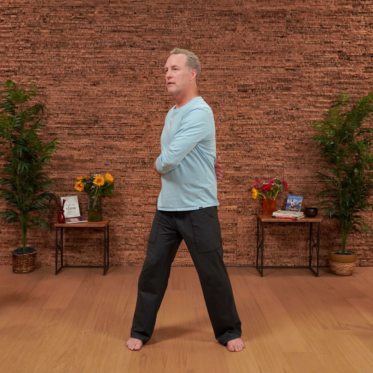 Man demonstrating Qigong movements