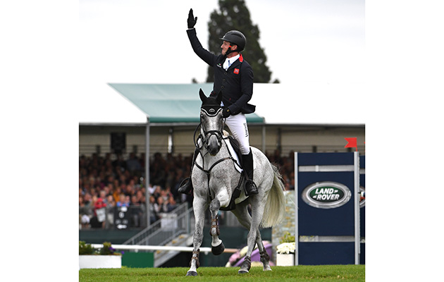 Raising the roof: Oliver Townend takes the Burghley title for the second time in his career, this time aboard Ballaghmor Class