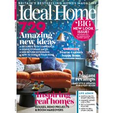blue coloured magazine cover with sofa 