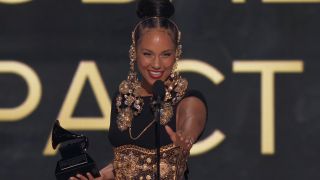 Alicia Keys accepting award at 2025 Grammys