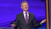 Ken Jennings holding arms apart while hosting Celebrity Jeopardy! Season 4