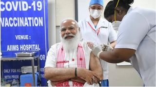 Narendra Modi taking Covod-19 vaccine shot