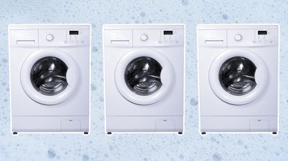 Three washing machines on soapy background