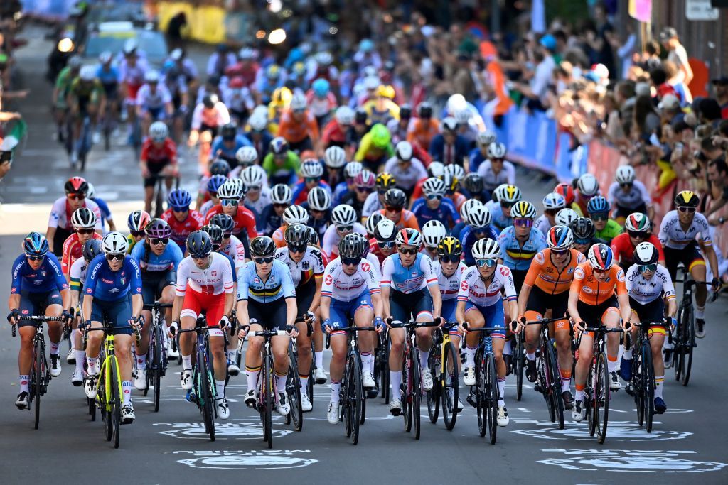The pack rides during the womens elite cycling road race 1577km from Antwerp to Leuven on the seventh day of the Flanders 2021 UCI Road World Championships on September 25 2021 Photo by ERIC LALMAND BELGA AFP Photo by ERIC LALMANDBELGAAFP via Getty Images
