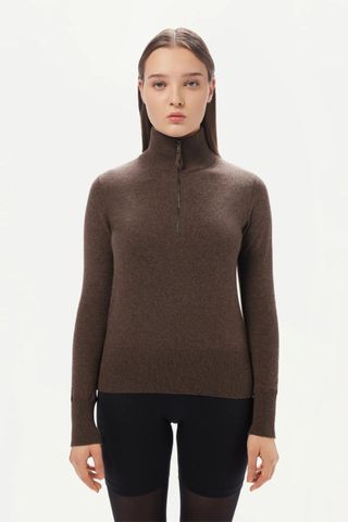 cold weather clothing - woman wearing brown high neck quarter zip cashmere top