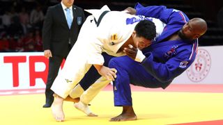 France&#039;s Teddy Riner (Blue R) fights against Japan&#039;s Tatsuru Saito (white) in the Men&#039;s +100kg Judo category in the build up to the 2024 Paris Olympic Games.