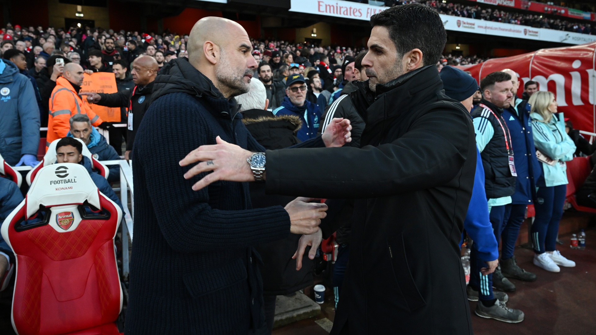 LONDON, ENGLAND - FEBRUARY 02: Pep Guardiola, Manager of Manchester City, embraces Mikel Arteta, Manager of Arsenal, prior to the Premier League match between Arsenal FC and Manchester City FC at Emirates Stadium on February 02, 2025 in London, England. (Photo by David Price/Arsenal FC via Getty Images)