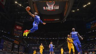 NBA player dunking ball during NBA All-Star game