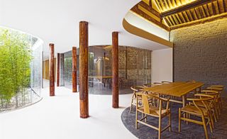 Cafe with wooden pillars and dining table