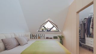 small master bedroom with dressing area in loft conversion