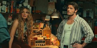 jessica rothe as young sarah and callum kerr as young everett in a garage in the 70s in a flashback in virgin river season 6