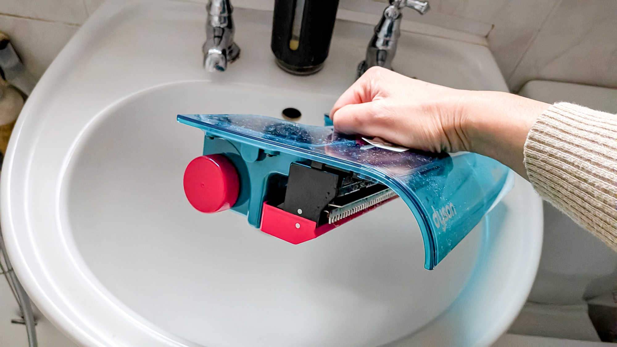 Dyson Clean + Wash Hygiene emptying waste water