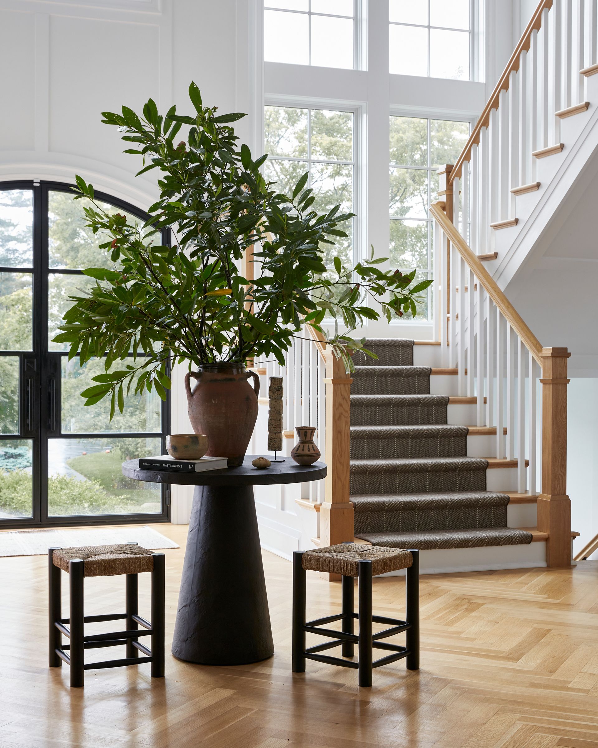 a modern entryway with a table