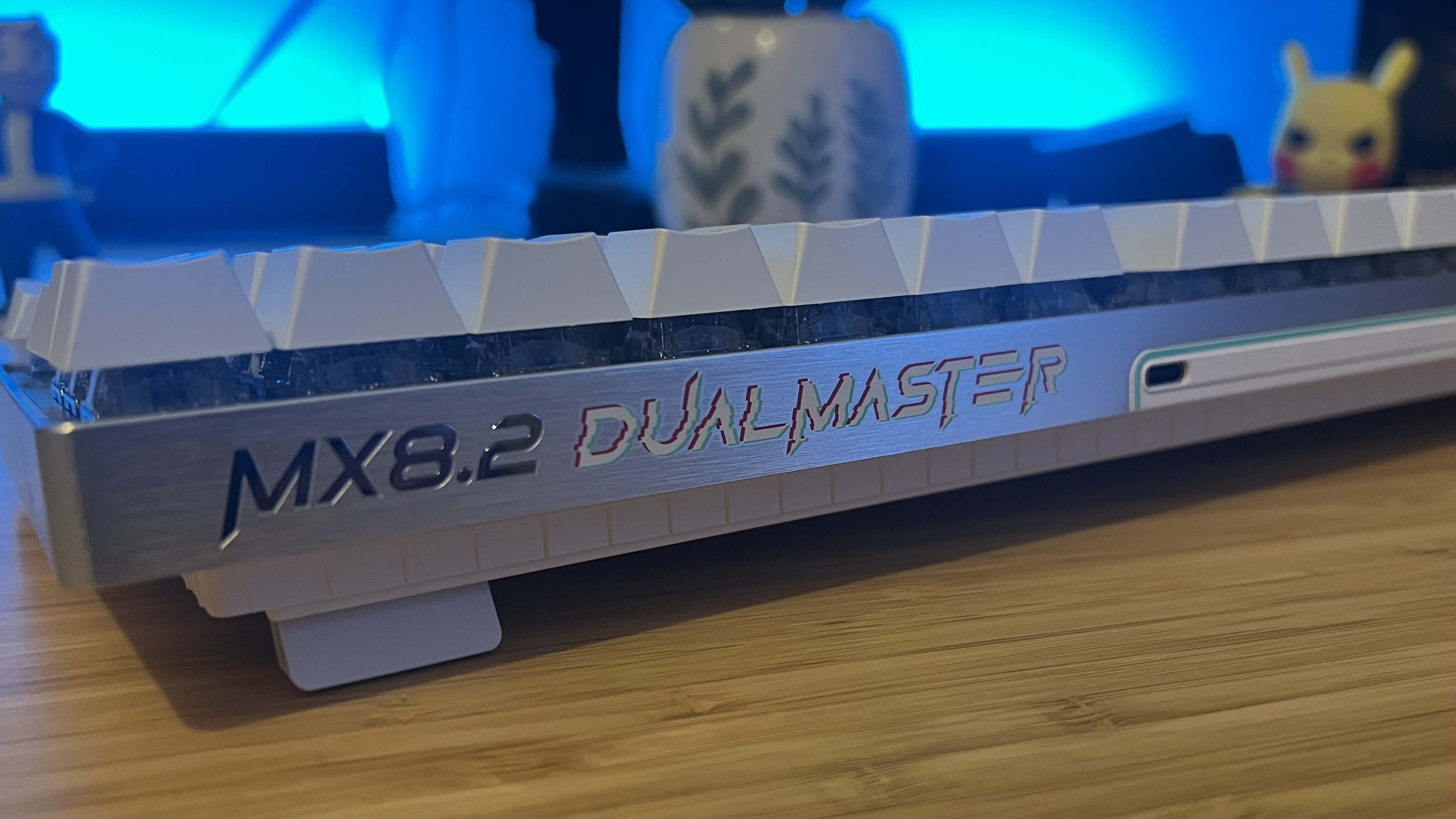 Close up on top of Cherry XTRFY MX 8.2 Pro TMR Wireless gaming keyboard showing DualMaster branding